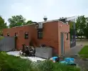 Containerbrand achter viswinkel