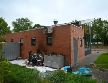 Containerbrand achter viswinkel