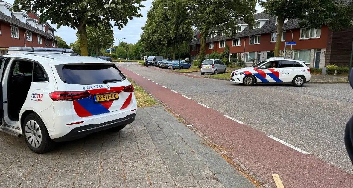 Schietpartij na voorbijrijden auto, politie doorzoekt straat - Foto 1