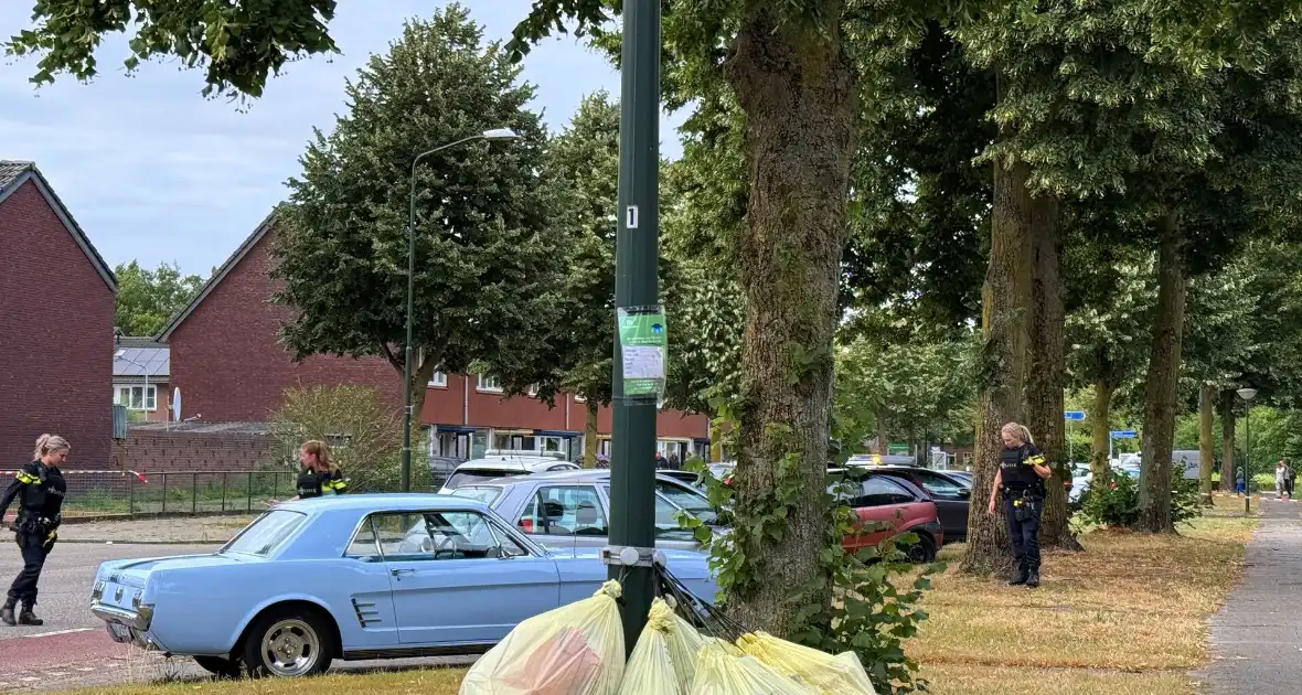Schietpartij na voorbijrijden auto, politie doorzoekt straat - Foto 5
