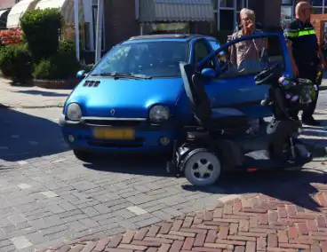 Automobilist botst op scootmobiel