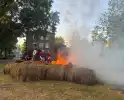 Flink aantal hooibalen in brand