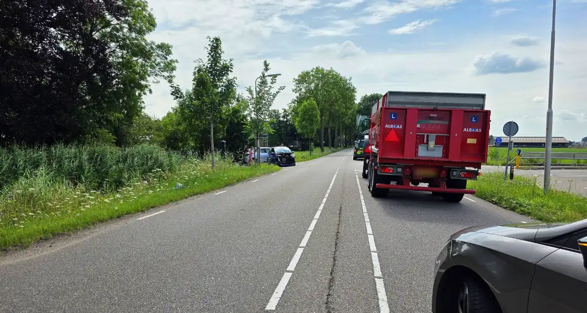 Ongeluk met tractor, auto en microcar - Foto 1