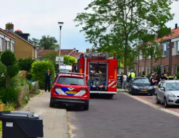 Afvalbrand bij woning trekt veel bekijks