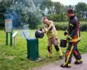 Brand in prullenbak gedoofd met emmers water