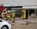 Brandweer blust brand in werkkast