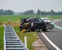 Auto crasht nabij nieuwe afslag
