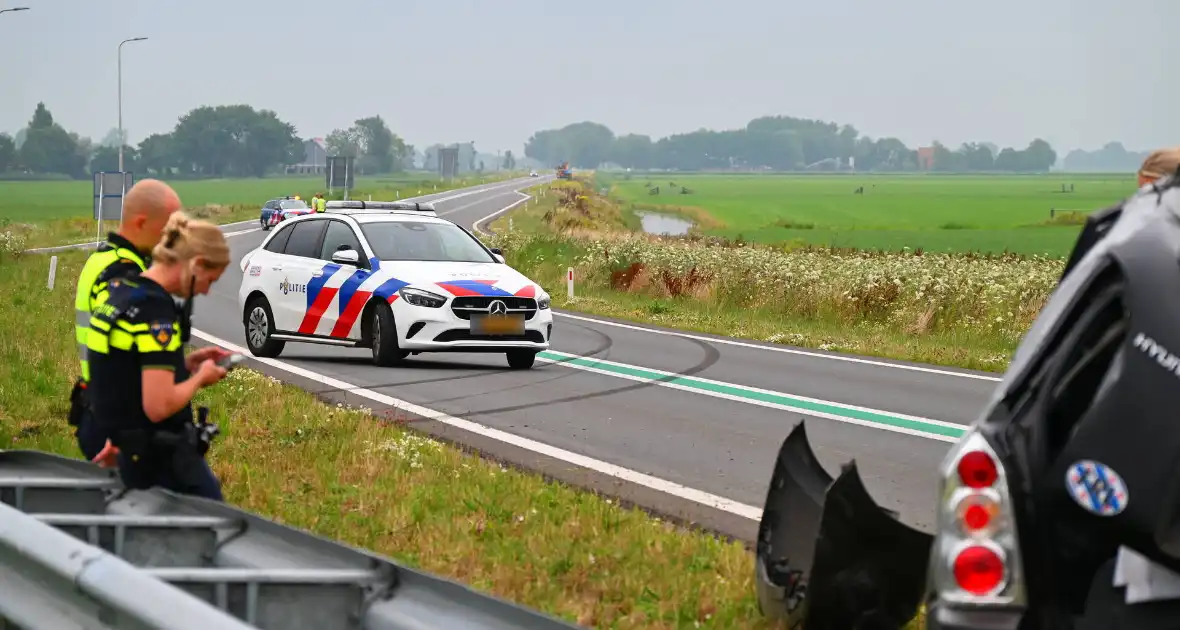 Auto crasht nabij nieuwe afslag - Foto 2
