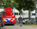 Brandweer redt persoon uit woning