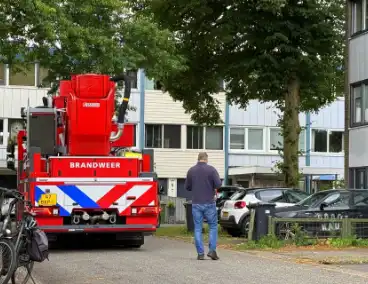 Brandweer redt persoon uit woning