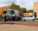 Ongeval tussen vuilniswagen en auto