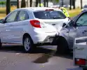 Flinke schade en gewonde bij botsing tussen twee auto's
