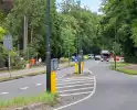 Persoon met verward gedrag op dak