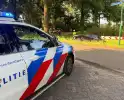 Auto in sloot na aanrijding met gewonde bestuurder