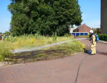 Brandweerinzet bij grasbrand