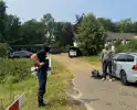 Inval door arrestatieteam met robothond