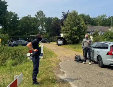 Inval door arrestatieteam met robothond