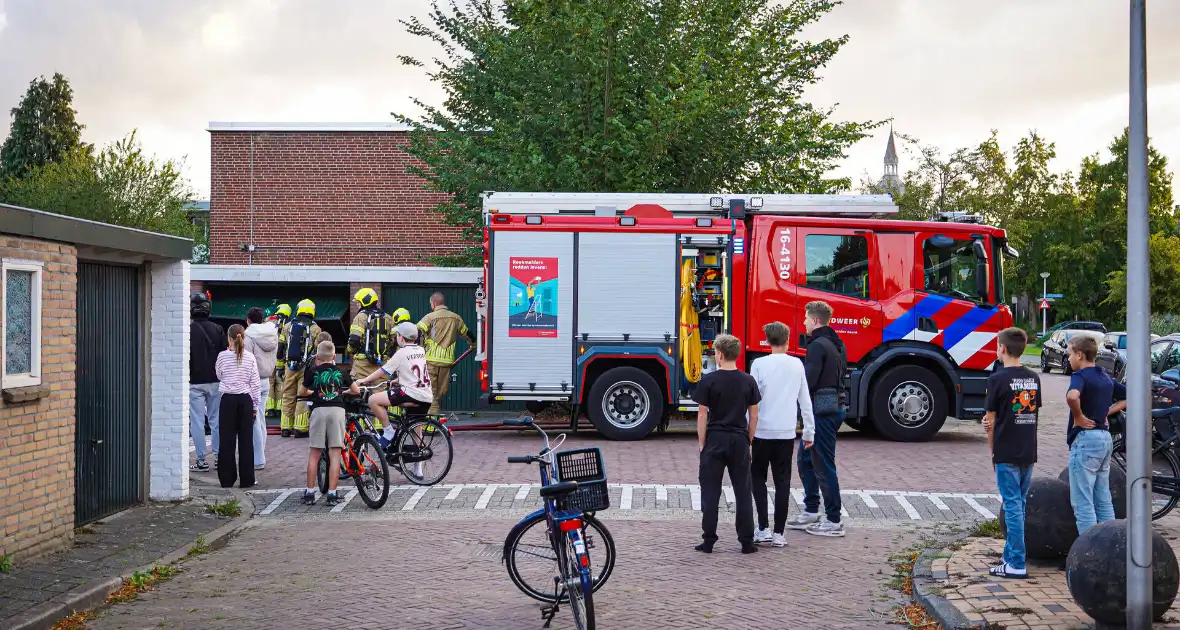 Veel brandschade aan garagebox - Foto 4