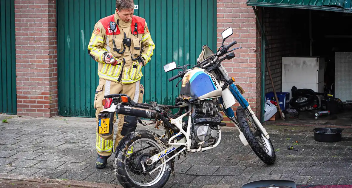 Veel brandschade aan garagebox - Foto 6