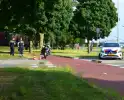 Scooterrijder in botsing op rotonde