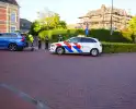 Racefietser en auto in aanrijding