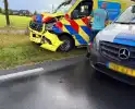 Botsing met ambulance veroorzaakt schade