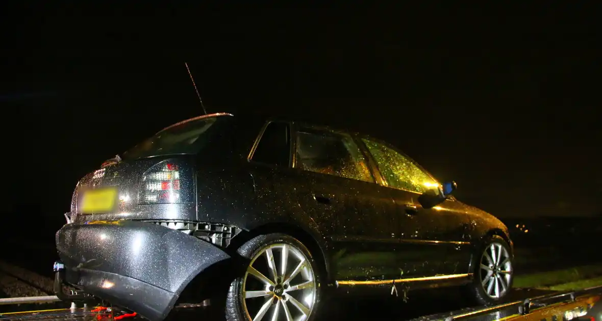 Automobilist haalt nat pak na te water raken - Foto 8