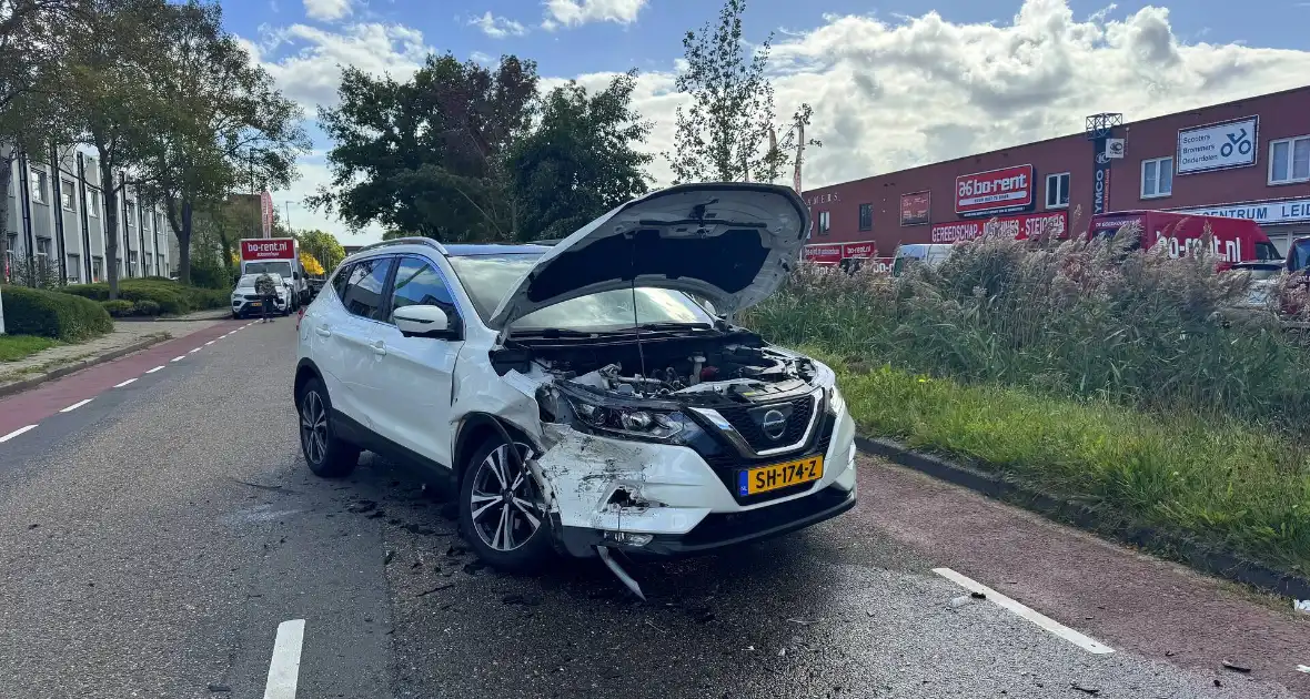 Brand na botsing bij tankstation - Foto 4