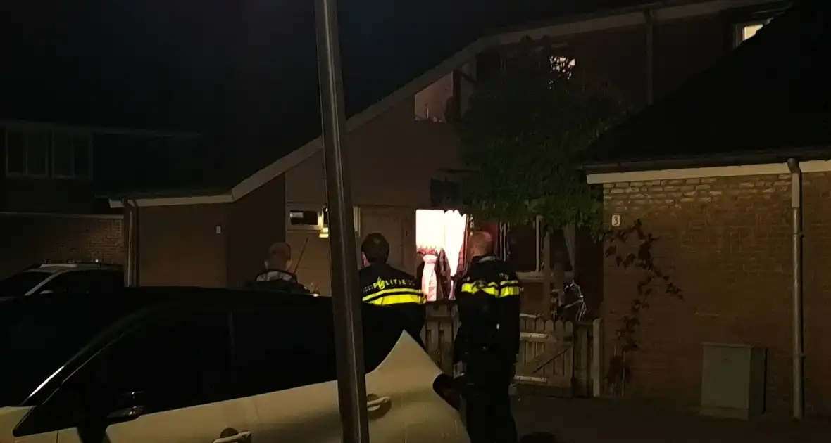 Voordeur vernield bij woningbrand - Foto 4