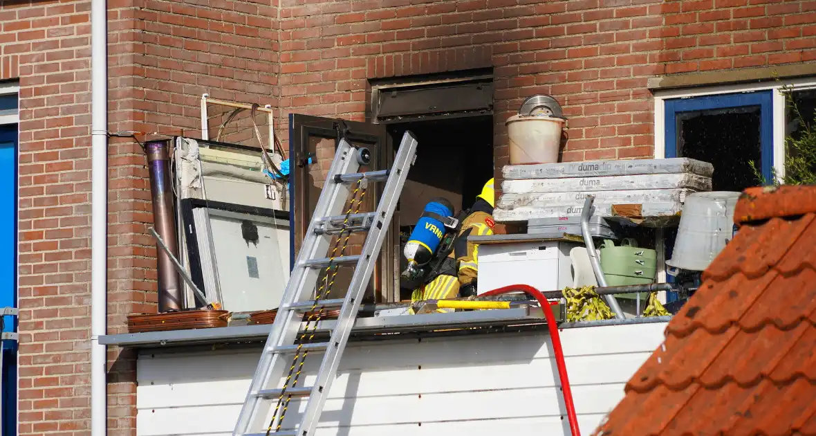 Woningbrand leidt tot ontruiming - Foto 10