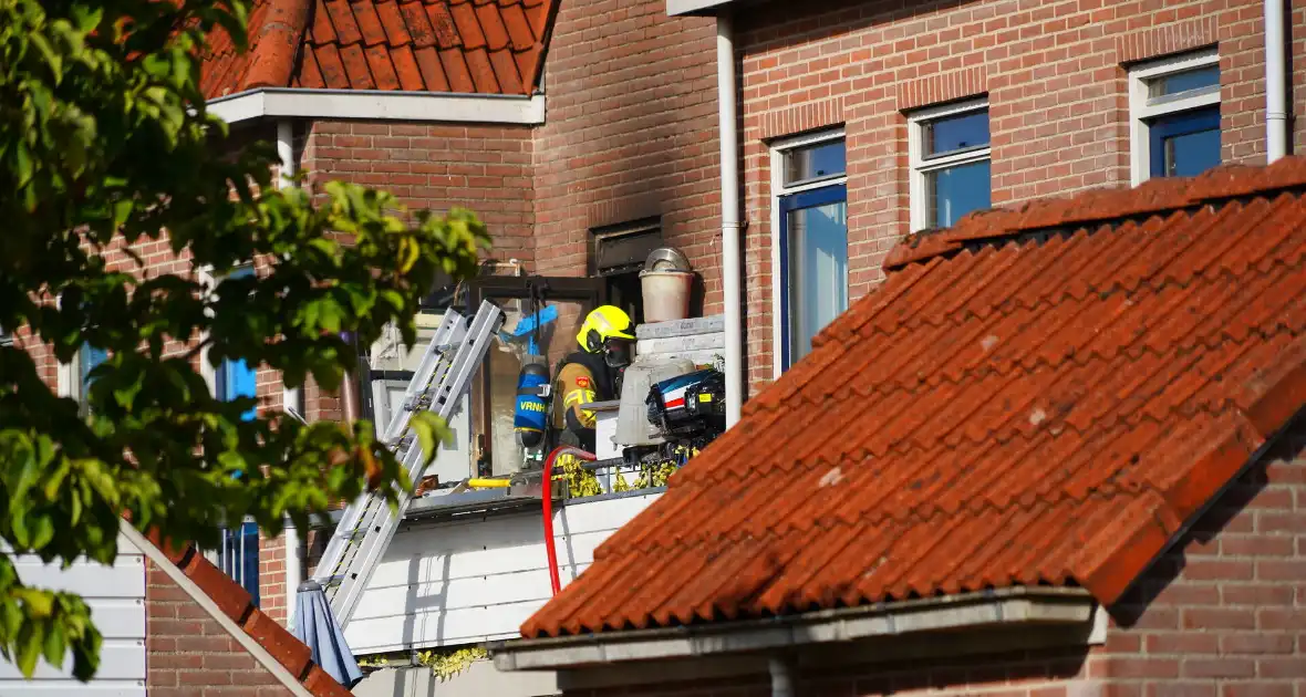 Woningbrand leidt tot ontruiming - Foto 9