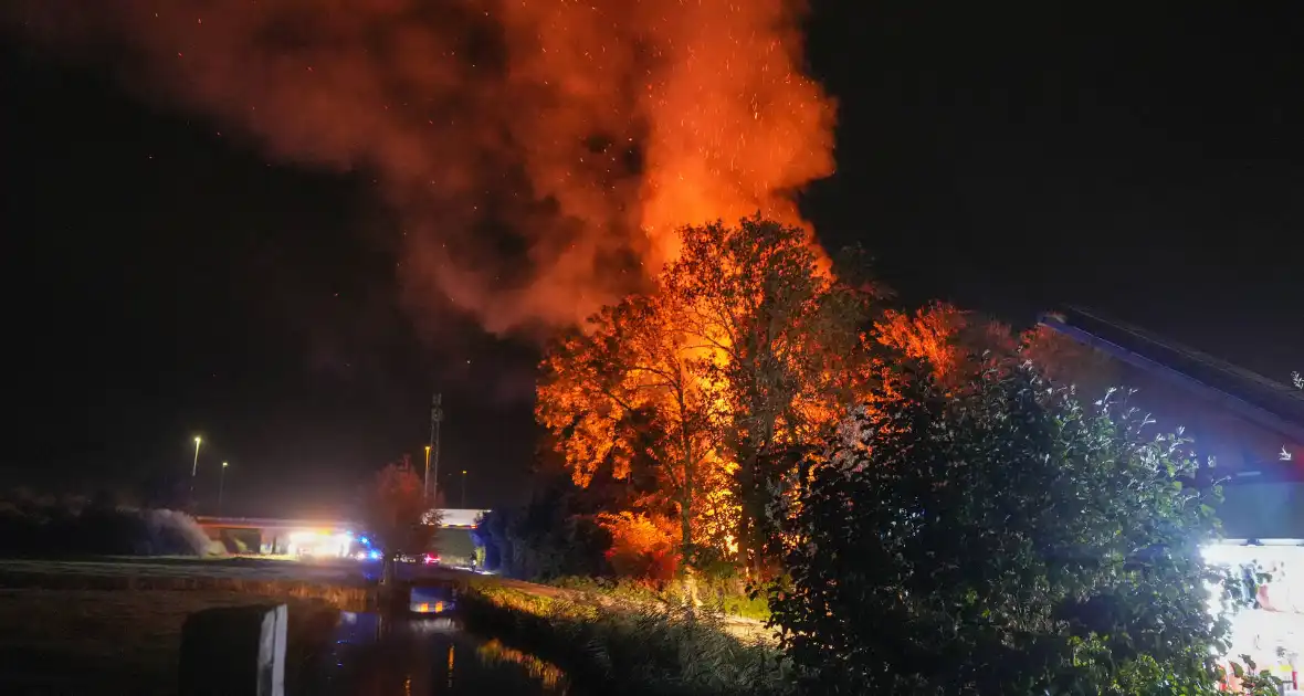 Woningbrand met veel bomen - Foto 1