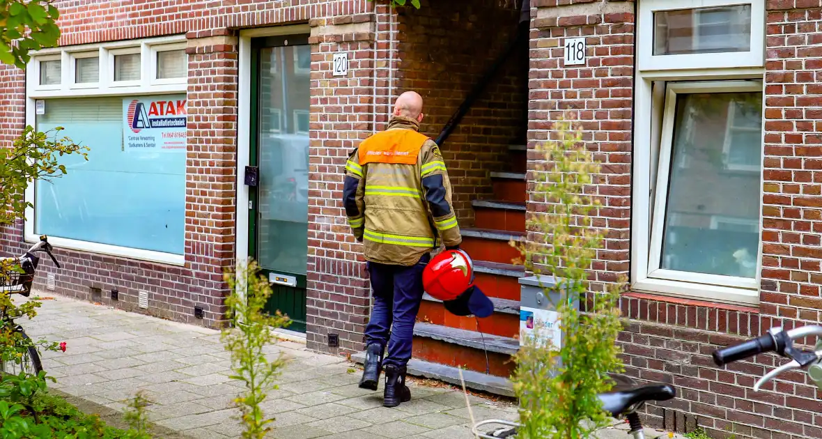 Woningbrand door vergeten pan leidt tot rookschade - Foto 2