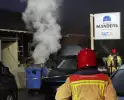 Brand in autobedrijf snel onder controle