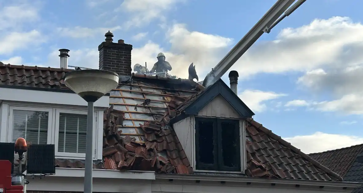 Enorme schade door woningbrand - Foto 1