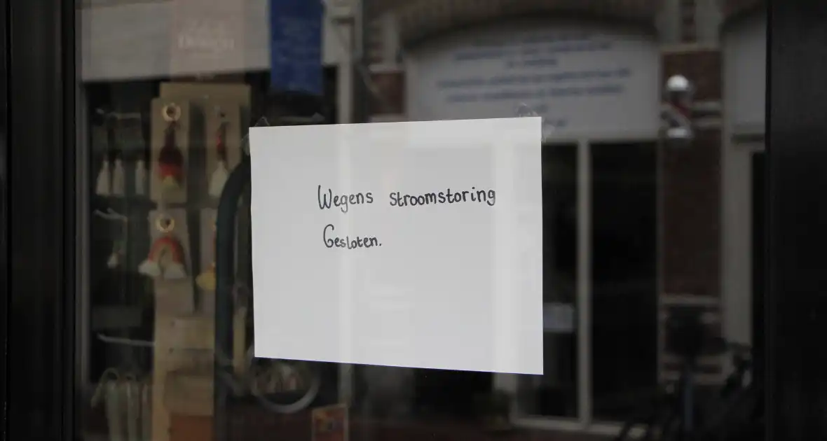 Stroomstoring sluit winkels tijdelijk - Foto 7