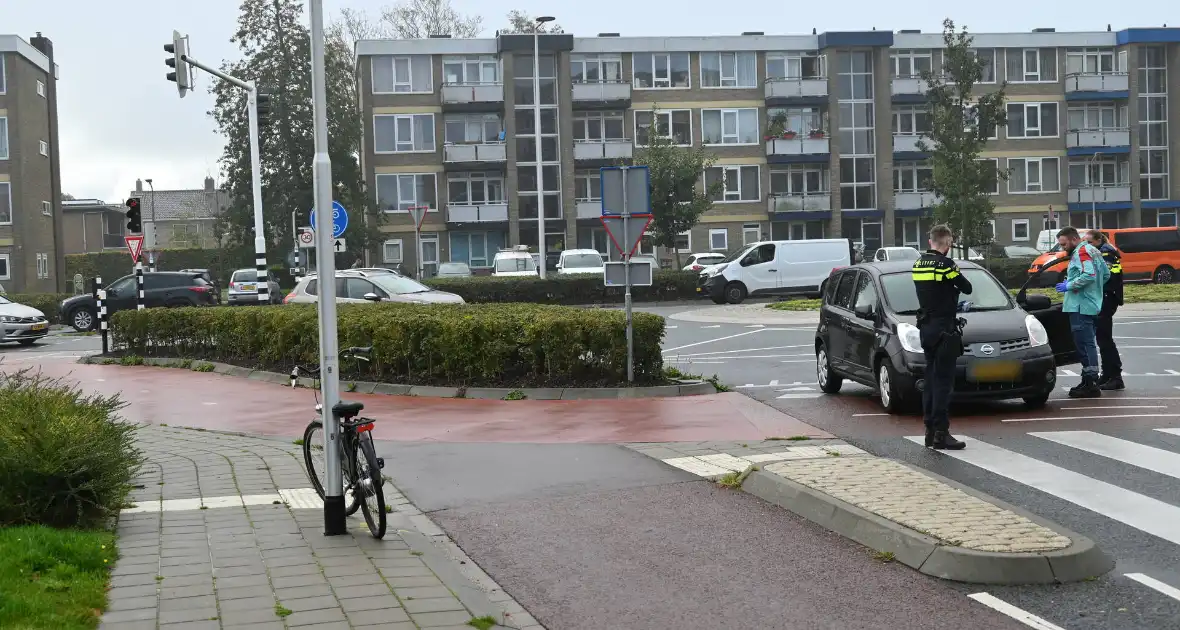 Brandweer bevrijdt beknelde fietser - Foto 9