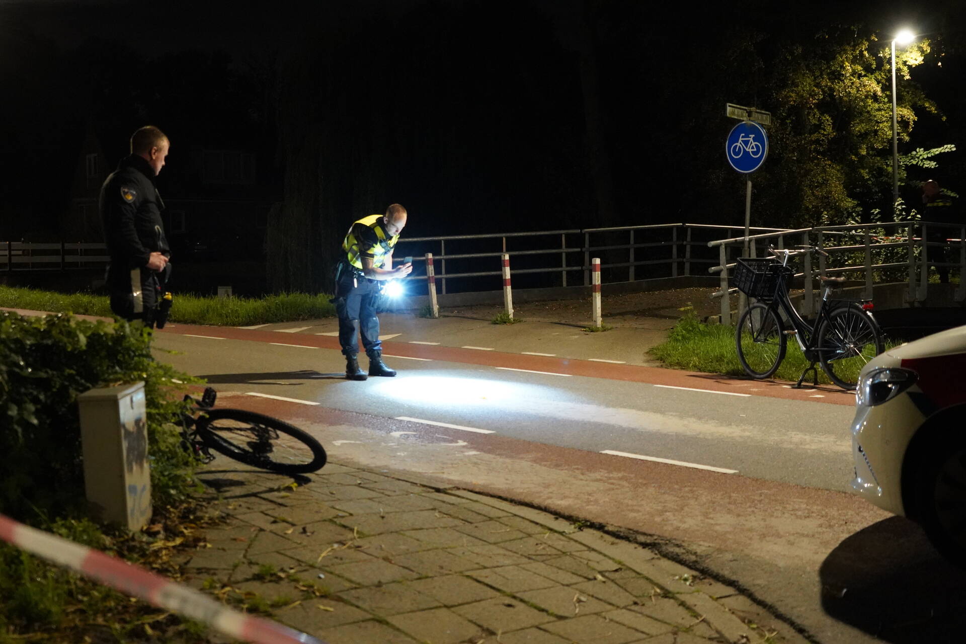 Fietser aangereden door politieauto