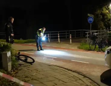 Fietser aangereden door politieauto