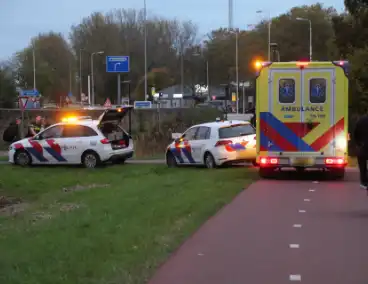 Fiets en scooter botsen op elkaar