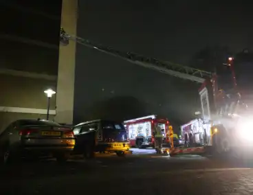 Woningbrand leidt tot ziekenhuisopname en politieonderzoek