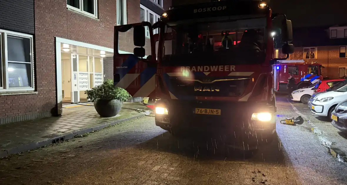 Appartementencomplex ontruimd door brand in meterkast - Foto 1
