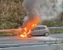 Auto in brand tijdens rit zonder gewonden