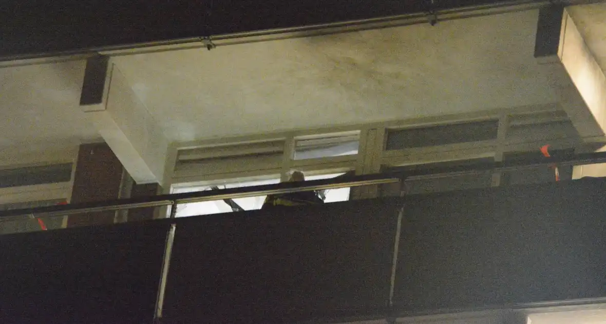 Appartementencomplex getroffen door brand - Foto 1