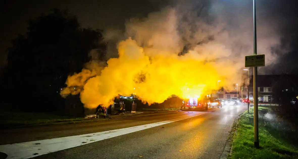 Brand in kledingcontainer veroorzaakt rookwolken - Foto 13