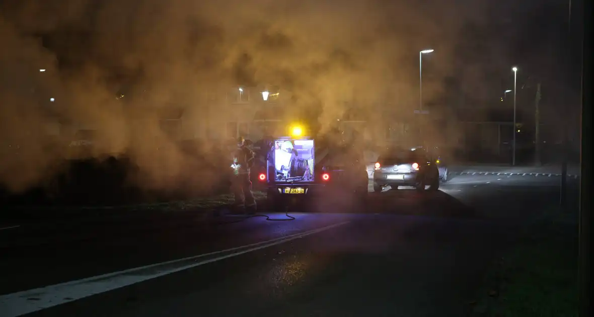 Brand in kledingcontainer veroorzaakt rookwolken - Foto 2