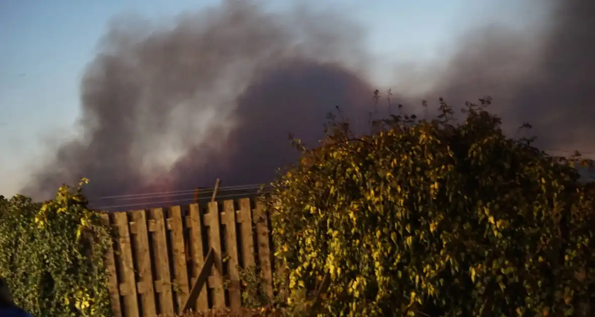 Flinke brand in plastic container bij afvalverwerker - Foto 2