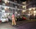 Scooter in brand in flatgebouw