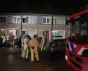Deur opengebroken bij brand in woning