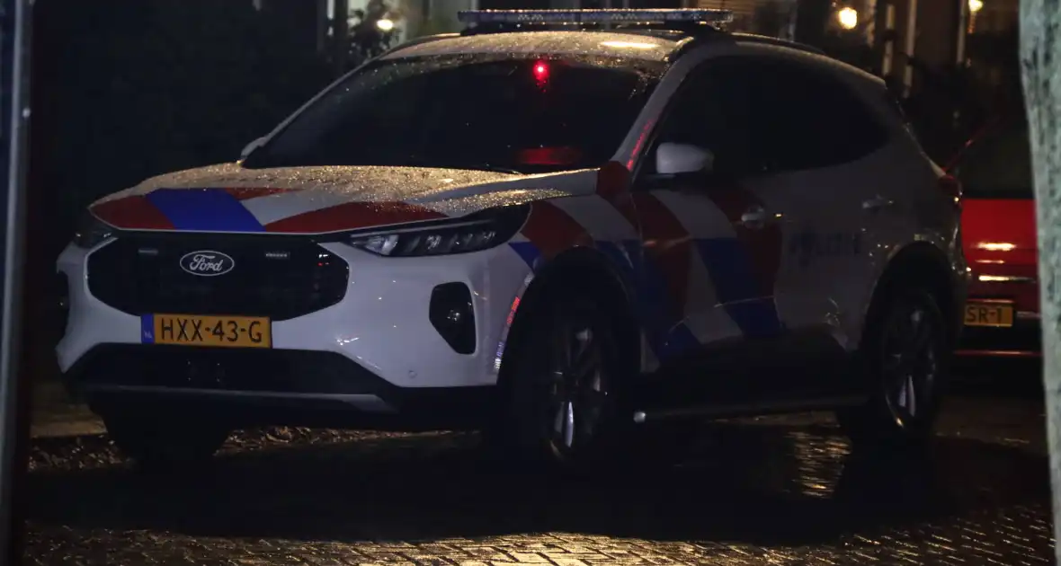 Deur opengebroken bij brand in woning - Foto 2